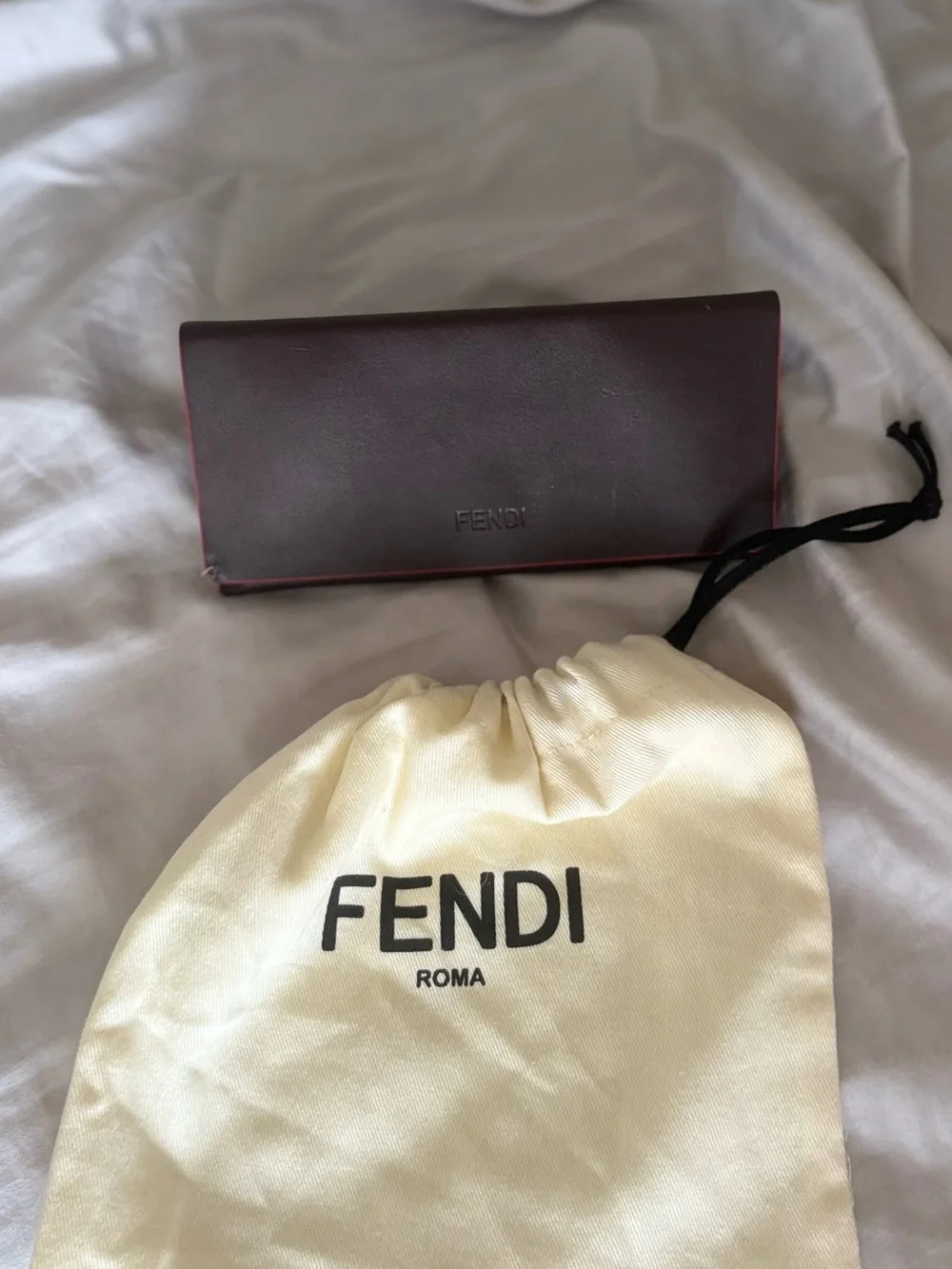 Fendi dust bag with glasses case.